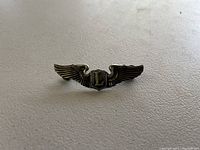 Sterling silver Air Force Liaison Large L Wings Badge showing front and side angles to detail wing and shield design.