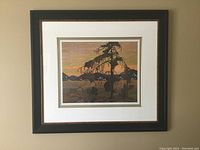 Framed print of The Jack Pine by Tom Thomson showcasing the artwork with mountain and pine tree landscape.