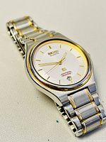 Angled front view showing case, bezel and bracelet