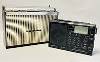 Front view of SONY TFM-951 and Realistic DX-380 radios side by side