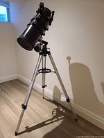 Full view of assembled Celestron PowerSeeker 127EQ telescope on aluminum tripod