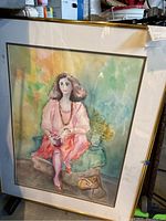 Full framed watercolor artwork showing a seated woman in pink dress with an abstract, colorful background.