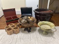 Full view of lot showing planter, decorative bowl with orbs, wooden boxes, and hexagonal organizer
