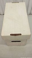 Closed white cardboard storage box