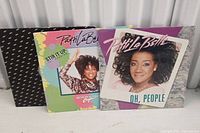Three Patti LaBelle vinyl record covers visible: 'Oh People', 'Stir It Up', and a third black/white patterned cover.