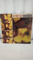 Full view of the front cover of the Van Morrison Moondance album showing the artist's face and text.