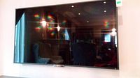 Front view of wall-mounted television