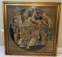 Framed print of the painting by Fra Angelico depicting the Adoration of the Magi in a circular design with gold-toned wood frame.