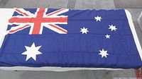 Full view of Australian flag showing Union Jack canton and right side with Southern Cross stars.