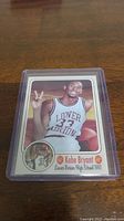 Front view of the 1992 Kobe Bryant Lower Merion High School basketball card showing Kobe in jersey with number 33.