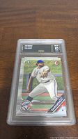 Front view of Alek Manoah 2020 Bowman Rookie Baseball Card in GMA 10 graded case showing player in pitching stance.