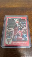 Front of Michael Jordan Star 88 reprint rookie card showing action basketball image with Chicago Bulls branding.