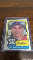 Front photo of the 2009 Mike Trout Future Stars Arizona League Prospects baseball card in a protective case.