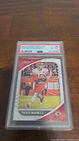 Front view of 2020 Panini Absolute Patrick Mahomes II football card graded PSA 6, encased in protective slab