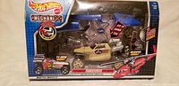 Photo of new boxed Hotwheels Mechanix transforming vehicle toy with V8 engine and helicopter sounds