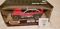 Front and partial side view of the Matchbox Collectibles Jeepster Concept diecast car in original box with Motor Trend branding.