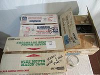 Box of 12 Mason wide mouth pint size canning jars and packaging boxes marked for 12 dozen wide mouth Mason jars.