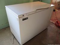 Full view of closed white Admiral chest freezer showing exterior condition and shape.