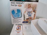 Box of the HOMEDICS Sole Therapy Foot Spa showing product image and features.