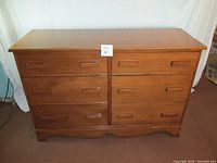 Front view of the Vilas solid maple wood 6-drawer dresser showing overall condition and design.