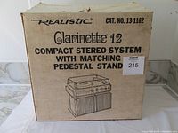 Photo of original packaging box of Realistic Clarinette 12 stereo system showing brand, model number, and product illustration.