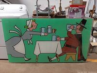 Front view of the rectangular commercial sign showing the cartoon waitress serving drinks to a seated man on green background.