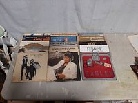 Photo showing a first set of vinyl LP albums including Fleetwood Mac's Rumours, Michael Jackson's Thriller, Eagles Live and others.