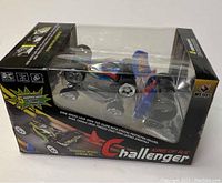 Photo of the boxed RC Challenger car showing packaging and car inside with branding and features.