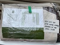 Two replacement canopy covers packaged in plastic. Label indicates Palm Beach gazebo replacement canopy, fits 3m x 3m gazebo.