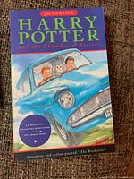 Harry Potter and the Chamber of Secrets English edition with flying car cover.
