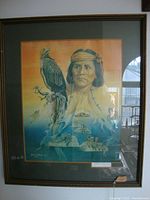 Framed Native American art print showing the full image of a Native American man with bird and landscape elements.