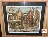 Frontal image of the framed print showing the winter neighborhood scene with snow and houses, label #74 in corner.