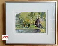 Framed watercolour painting showing the entire artwork with frame in natural indoor lighting.