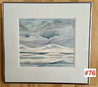 Framed painting of an arctic landscape with icy terrain, mountains, and clouds, titled "Arctic Ice" by Myra Barook.