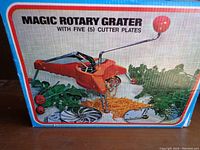 Box of Magic Rotary Grater showing an image of the grater and its food grating function.
