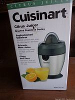 Box for Cuisinart Citrus Juicer showing product features and stainless steel finish