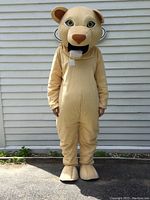 Full front view of a person wearing the beige lion furry suit with oversized lion head covering face, standing straight with arms at sides.
