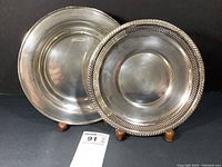 Two plates displayed side by side, showing deep and reticulated designs