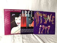 Front cover view of Duran Duran, ABC, and Prince 1999 vinyl records.
