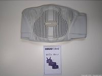 Front view of light grey Obusforme back support belt showing vertical black stripes, padded back panel, and Obusforme logo label.