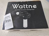 Box of Wattne Handheld Percussion Massage Gun showing product branding and image.