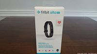 Front view of Fitbit Alta HR box showing product image and branding
