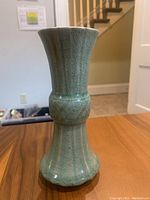 Front view of vase showing overall Gu form and crackle glaze