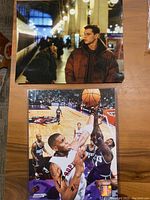 Signed photo of Mat Damon, wearing brown jacket in indoor scene with small scratch.