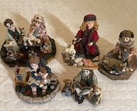 All five Boyds Yesterdays Child resin figurines on a light textured surface. Each figurine depicts children with teddy bears in various scenes.