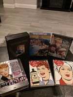 Photo of six DVD box sets for classic TV shows including two Love Lucy sets, Andy Griffith Show sets, Best of Lucy Show, and Murder She Wrote boxed set