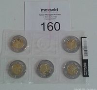 Set of five 2014 Canadian $2 coins sealed in original plastic packaging from the Royal Canadian Mint, displayed with a MaxSold auction lot number card.