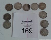 Front side view of all 10 coins arranged around MaxSold auction card, showing details and wear.