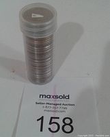 Stack of 40 USA State Quarters in a plastic coin tube.