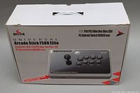 Closed box showing product branding and compatibility information for the Mayflash Universal Arcade Stick F500 Elite, listing supported consoles.